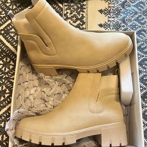 Pale tan lug boots.  Never worn, new in box!